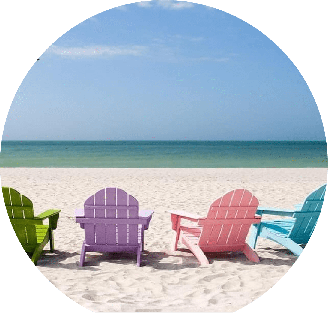 Colorful chairs lined up on a serene beach facing the ocean.